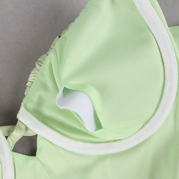 green bodycon satin dress close up