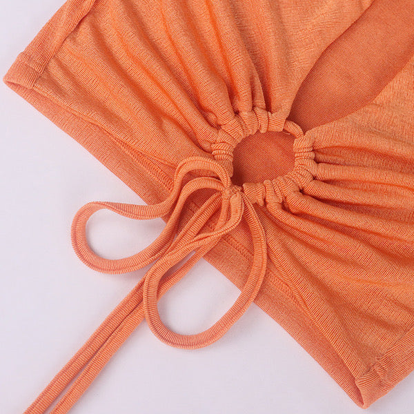 orange long sleeved crop top detail